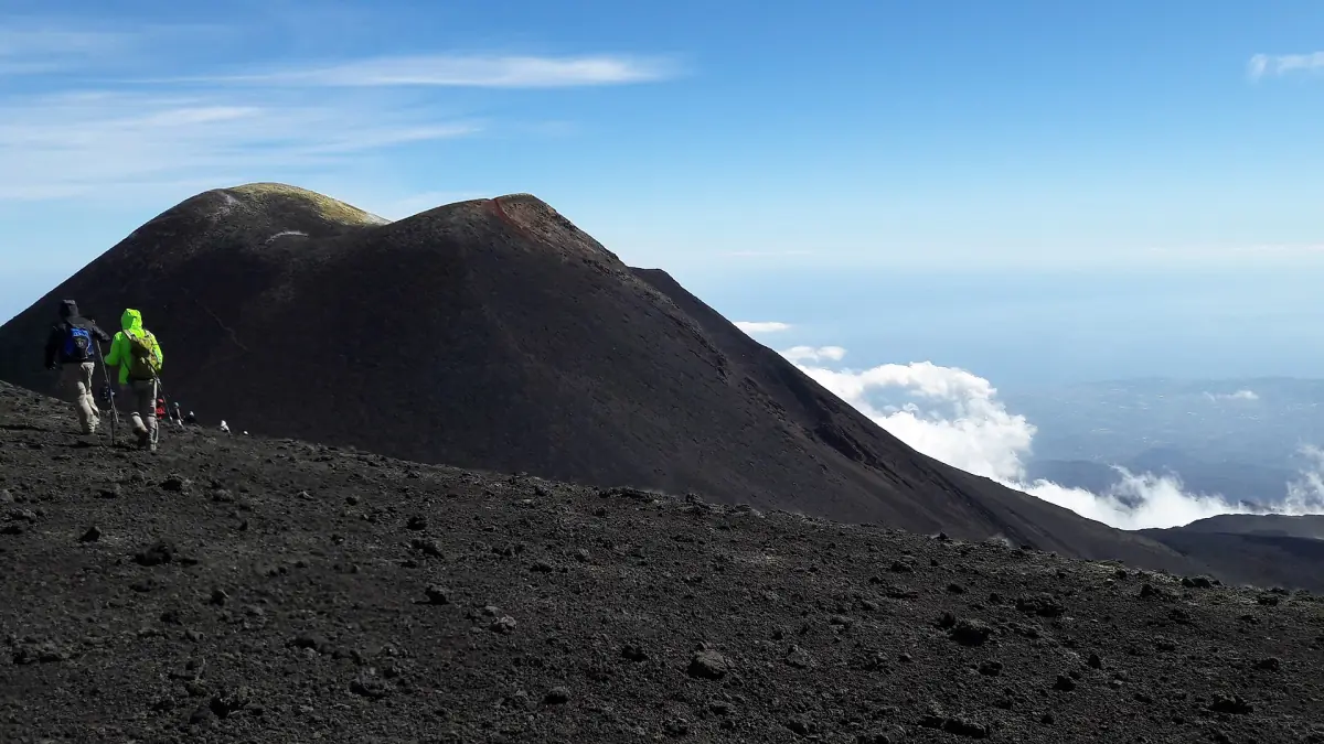 Hikers near the summit craters of Etna